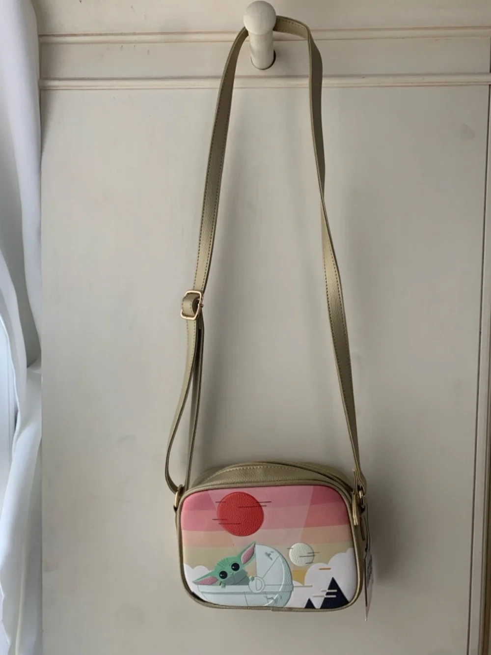 Danielle Nicole Gold Crossbody with Pink Sunset Grogu Print - Picture 1 of 3